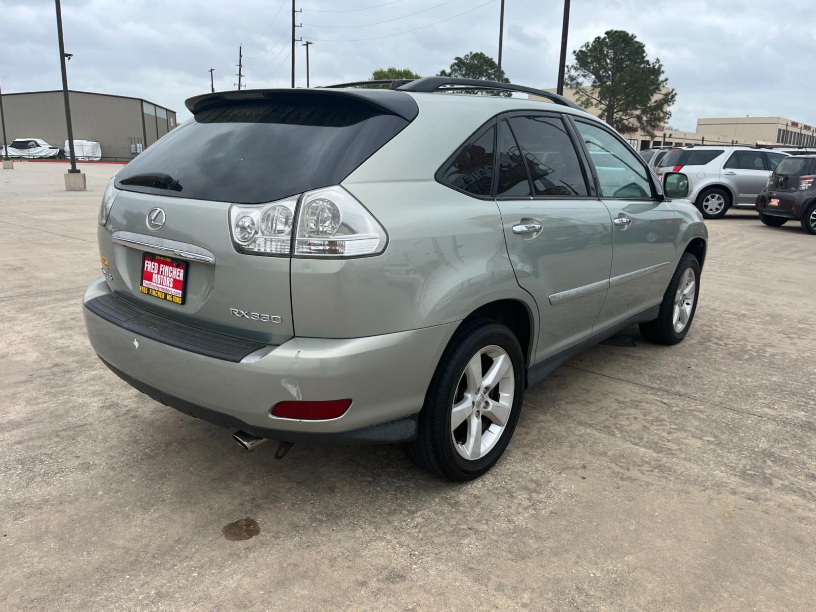 2004 SILVER /TAN Lexus RX 330 2WD (2T2GA31U44C) with an 3.3L V6 DOHC 24V engine, 5-Speed Automatic Overdrive transmission, located at 14700 Tomball Parkway 249, Houston, TX, 77086, (281) 444-2200, 29.928619, -95.504074 - Photo #6